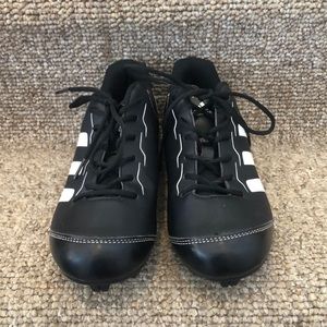 Adidas baseball cleats.